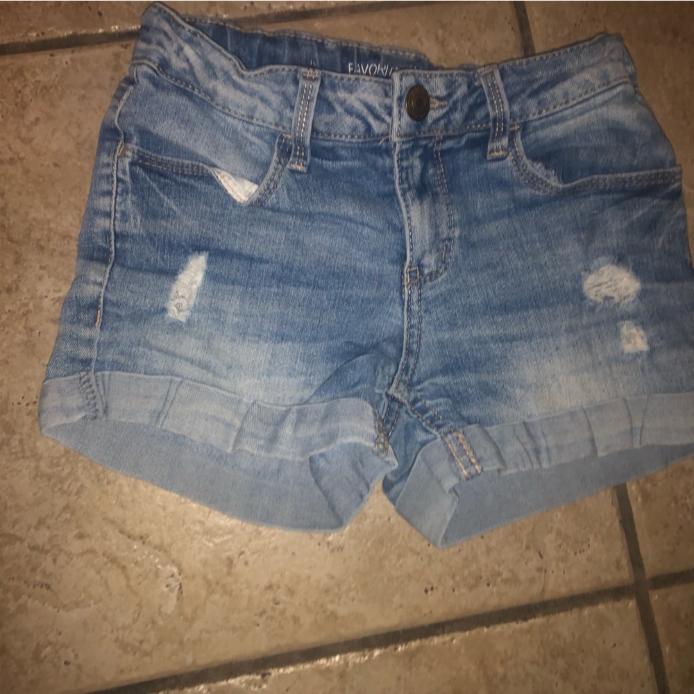 Selling old clothes. Blue booty short. Size 10 good condition
